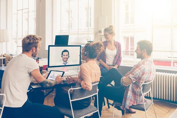 group of colleagues having online video chat